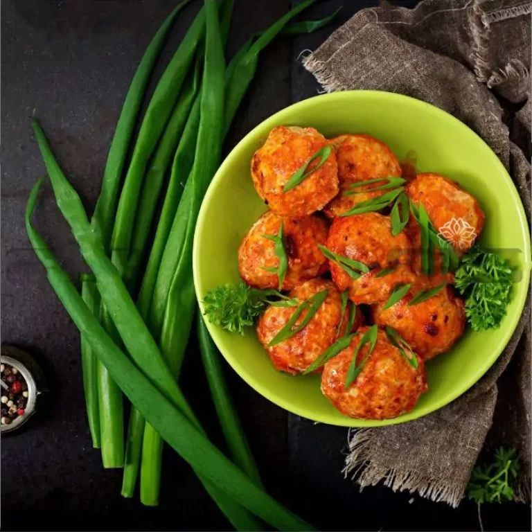 baked-meatballs-of-chicken-fillet-in-tomato-sauce-pgk6ptm-658a8cd5dab49